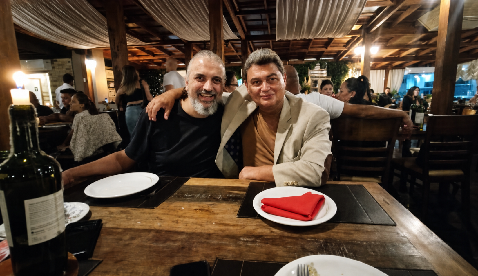 Gustavo Dominguez sharing a social moment with a Lamborghini group executive